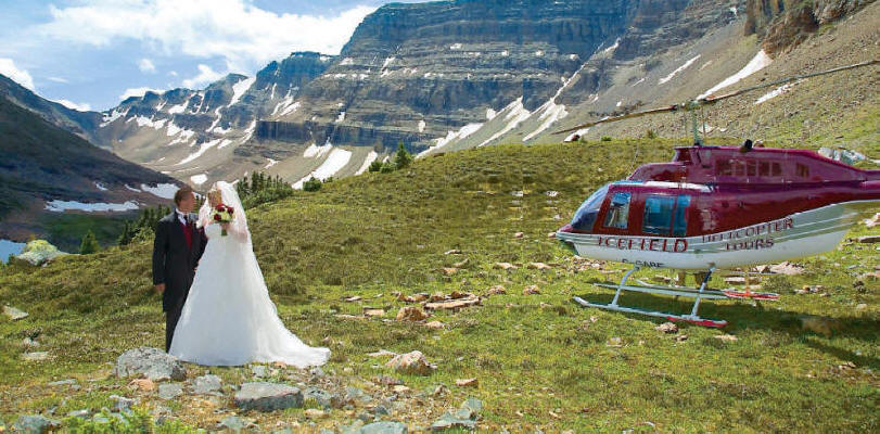 Get married on a Banff area mountain top with a helicopter wedding.